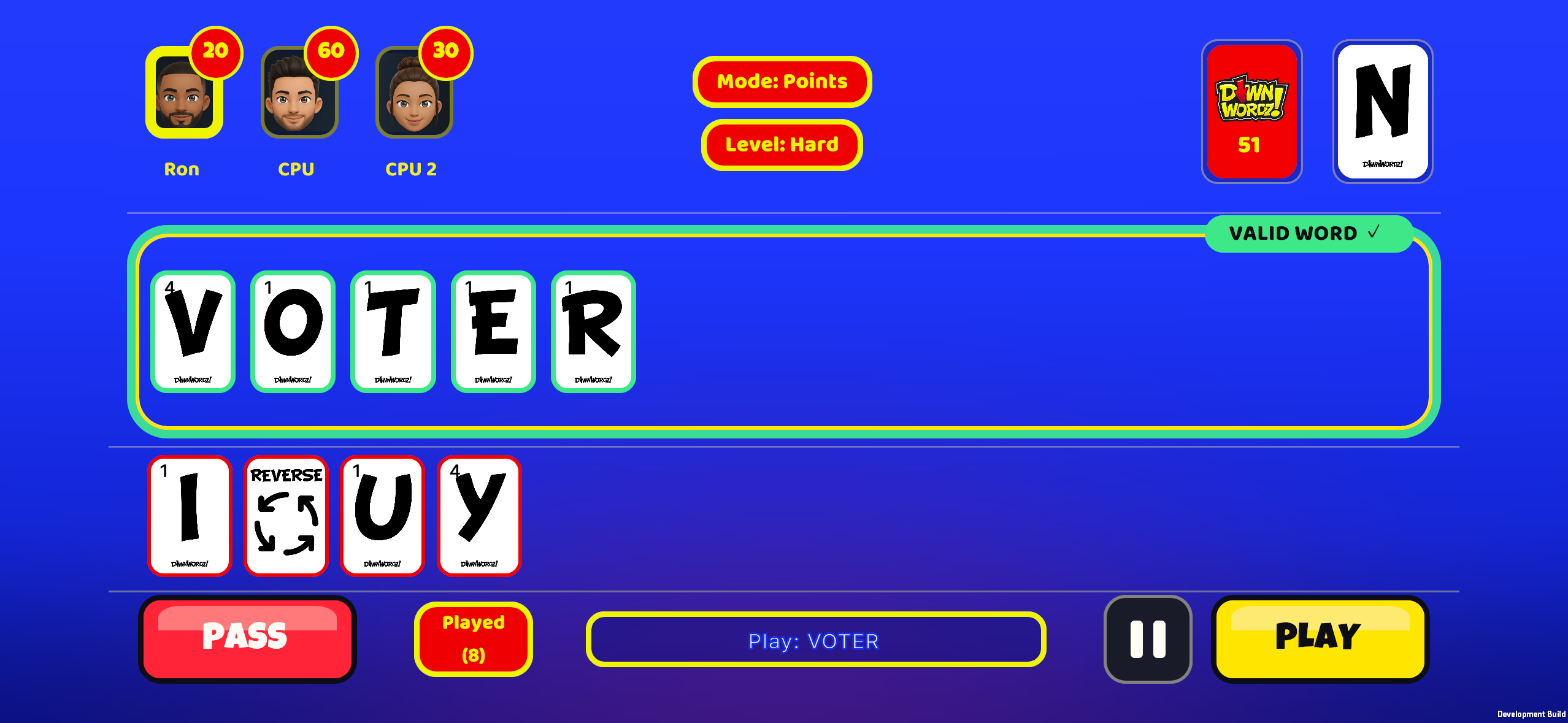 DownWordz gameplay screen showing letter cards and word building